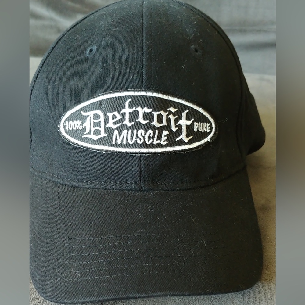When feeling the need for speed don this Black Detroit Muscle Cap